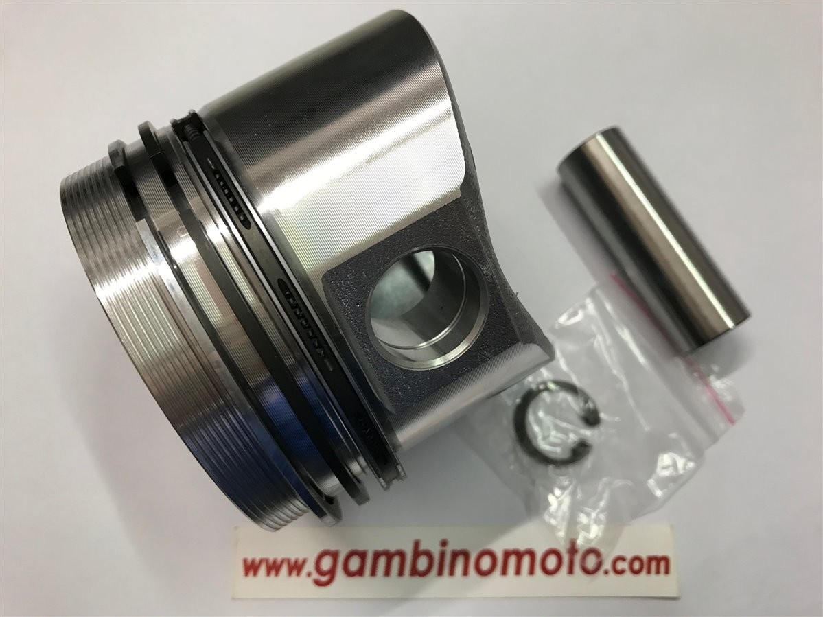 PISTONE COMPLETO MOTORE RUGGERINI RY103 DIAMETRO 82,50 1° MAGGIORAZIONE  3 segmenti diam. spinotto 23 mm camera decentrata diam. 37,6 mm altezza cielo spinotto 41 mm 