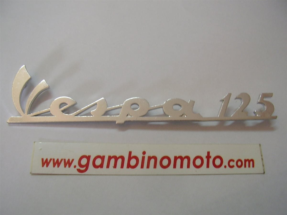 TARGHETTA ANTERIORE VESPA PRIMAVERA 125 DAL 68 AL 74 LUNGHEZZA MM.140  